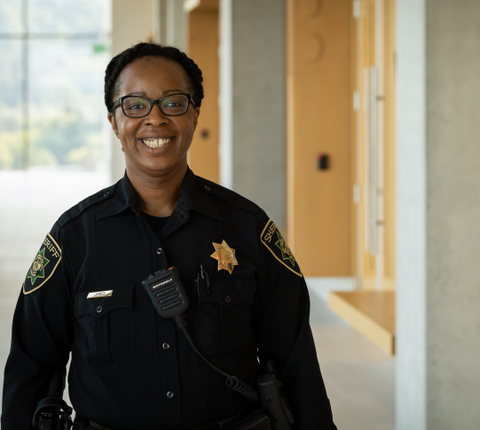 Deputy in the hallway of the courthouse.