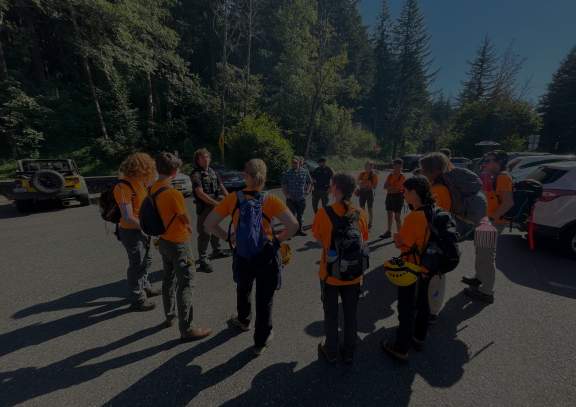 Group of Search and Rescue volunteers gather before deploying at Angels Rest.