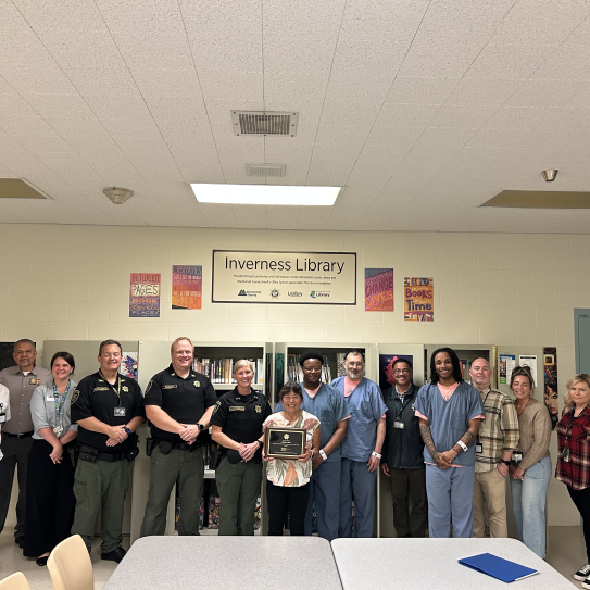 MCSO Sheriff Nicole Morrisey O’Donnell Dedicates Inverness Jail Library to Retired Librarian Carol Cook 