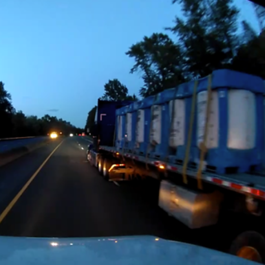 A screenshot from a dash camera video showing the moments leading up to a crash. 