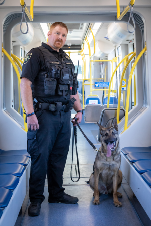 Deputy in transit train with K9.