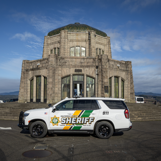 Patrol vehicle with new branding parked outside of the Vista House.