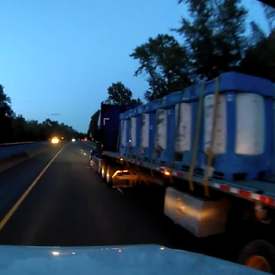 A screenshot from a dash camera video showing the moments leading up to a crash. 
