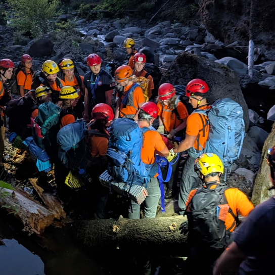 Rescuers use technical rope systems to rescue hiker