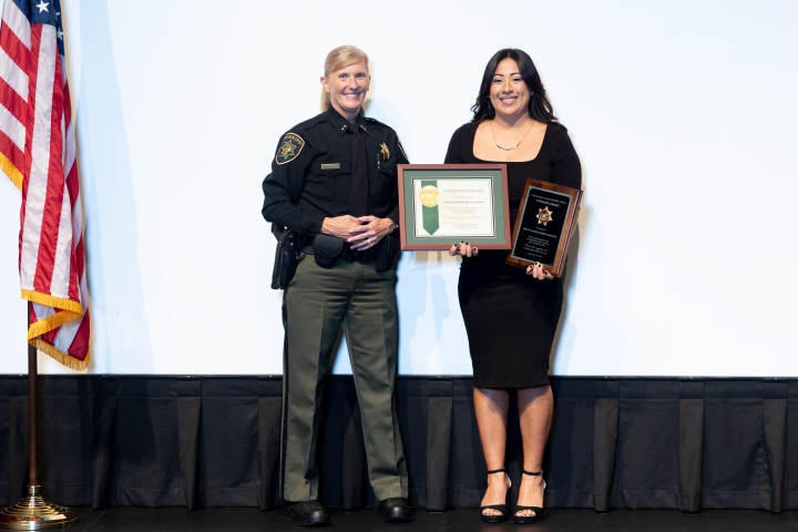 Sheriff Nicole Morrisey O'Donnell presents one of the 2025 MCSO Awards.