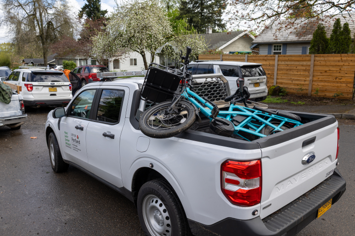 A stolen bike, worth approximately $5,000, shown loaded into the City of Portland vehicle to be reunited with its owner. 