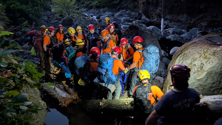 Rescuers use technical rope systems to rescue hiker