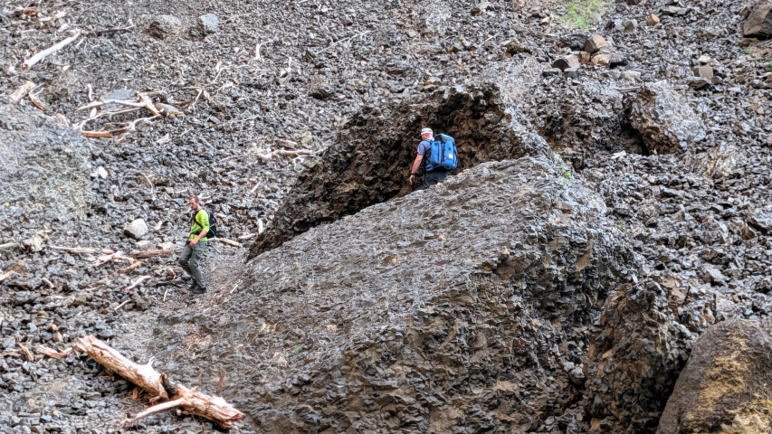 Rescuers navigate steep terrain near Elowah Falls