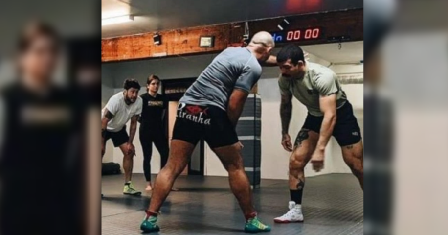 Sgt. Bryant (left) trains with another member of the Burnaby Mountain Wrestling Club.