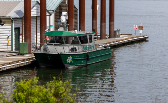 A River Patrol Unit vessel docked along the Columbia River
