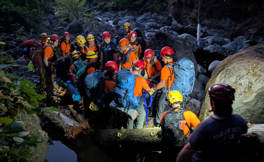 Rescuers use technical rope systems to rescue hiker